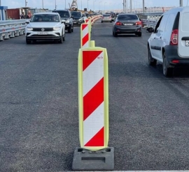 Поврежденную в июле часть крымского моста открыли для автомобилей после ремонта